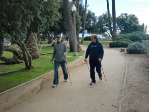 People nordic walking on trail